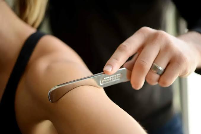 Instrument-assisted soft tissue mobilization of the shoulder